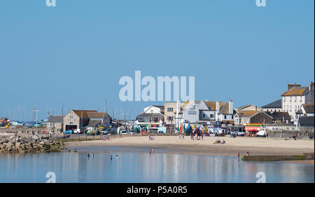 Lyme Regis, Dorset, UK. 26th June 2018. UK Weather: Hot and sunny morning in Lyme Regis. A calm scene on the beach before the crowds arrive to enjoy the sun on the hottest day of the year so far. Credit: Celia McMahon/Alamy Live News. Stock Photo