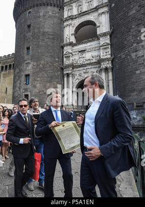 The honorary citizenship of Naples is given to Alberto Angela by the mayor Luigi De Magistris in the hall of the barons of the Maschio Angioino castle. 06/26/2018 - Naples, Italy Stock Photo