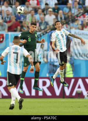 Saint Petersburg, Russia. 26th June, 2018. Angel Di Maria (R) of Argentina competes for a header with Leon Balogun of Nigeria during the 2018 FIFA World Cup Group D match between Nigeria and Argentina in Saint Petersburg, Russia, June 26, 2018. Credit: Yang Lei/Xinhua/Alamy Live News Stock Photo