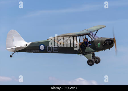 Piper J-3C-65 Cub (Piper L-4 grasshopper) single engine light aircraft in the markings of No.4 Squadron Roy Stock Photo
