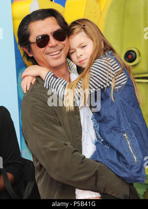 Lou Diamond Phillips, Daughter Indigo at the Cloudy With a Chance of Meatball 2 Premiere at the Westwood Village Theatre in Los Angeles.Lou Diamond Phillips, Daughter Indigo ------------- Red Carpet Event, Vertical, USA, Film Industry, Celebrities,  Photography, Bestof, Arts Culture and Entertainment, Topix Celebrities fashion /  Vertical, Best of, Event in Hollywood Life - California,  Red Carpet and backstage, USA, Film Industry, Celebrities,  movie celebrities, TV celebrities, Music celebrities, Photography, Bestof, Arts Culture and Entertainment,  Topix, vertical,  family from from the yea Stock Photo