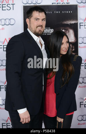 Marcus Luttrell, Melanie Juneau at theLone Survivor Premiere at the TCL ...