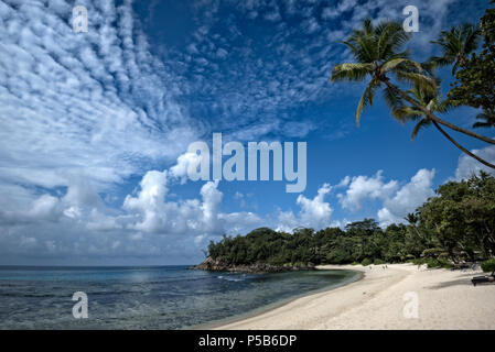 A view of Grand Anse beach of Mahe, Seychelles,Africa, on a perfect sunshine day creating a mood of freshness and vigor Stock Photo