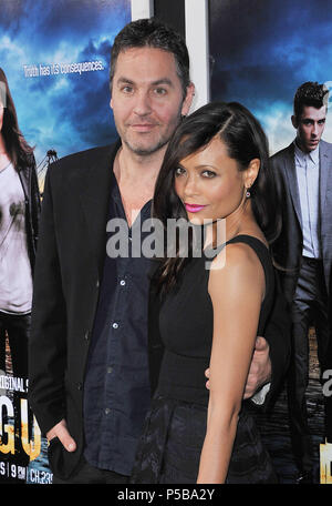 Thandie Newton and husband Ol Parker  at the ROGUE Premiere at the Arclight Theatre In Los Angeles.a Thandie Newton and husband Ol Parker 05 ------------- Red Carpet Event, Vertical, USA, Film Industry, Celebrities,  Photography, Bestof, Arts Culture and Entertainment, Topix Celebrities fashion /  Vertical, Best of, Event in Hollywood Life - California,  Red Carpet and backstage, USA, Film Industry, Celebrities,  movie celebrities, TV celebrities, Music celebrities, Photography, Bestof, Arts Culture and Entertainment,  Topix, vertical,  family from from the year , 2013, inquiry tsuni@Gamma-USA Stock Photo