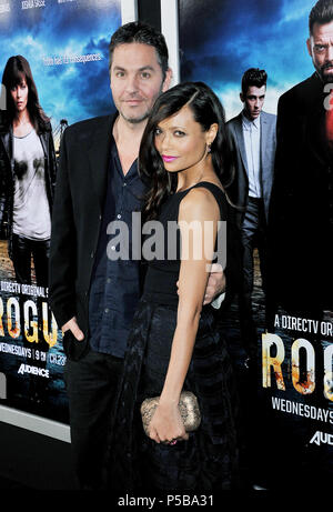 Thandie Newton and husband Ol Parker  at the ROGUE Premiere at the Arclight Theatre In Los Angeles.a Thandie Newton and husband Ol Parker 06 ------------- Red Carpet Event, Vertical, USA, Film Industry, Celebrities,  Photography, Bestof, Arts Culture and Entertainment, Topix Celebrities fashion /  Vertical, Best of, Event in Hollywood Life - California,  Red Carpet and backstage, USA, Film Industry, Celebrities,  movie celebrities, TV celebrities, Music celebrities, Photography, Bestof, Arts Culture and Entertainment,  Topix, vertical,  family from from the year , 2013, inquiry tsuni@Gamma-USA Stock Photo