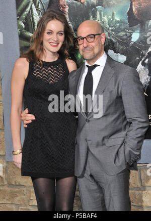 Stanley Tucci,  Wife Felicity Blunt  arriving Jack The Giant Slayer Premiere at the Chinese Theatre In Los Angeles.  Anthony Lapaglia, Wife Gia Carides 09 ------------- Red Carpet Event, Vertical, USA, Film Industry, Celebrities,  Photography, Bestof, Arts Culture and Entertainment, Topix Celebrities fashion /  Vertical, Best of, Event in Hollywood Life - California,  Red Carpet and backstage, USA, Film Industry, Celebrities,  movie celebrities, TV celebrities, Music celebrities, Photography, Bestof, Arts Culture and Entertainment,  Topix, vertical,  family from from the year , 2013, inquiry t Stock Photo