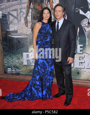 William Fichtner, Wife Kymberly  arriving at the Lone Ranger premiere at  the Disney California Adventure park in Anaheim.William Fichtner, Wife Kymberly  ------------- Red Carpet Event, Vertical, USA, Film Industry, Celebrities,  Photography, Bestof, Arts Culture and Entertainment, Topix Celebrities fashion /  Vertical, Best of, Event in Hollywood Life - California,  Red Carpet and backstage, USA, Film Industry, Celebrities,  movie celebrities, TV celebrities, Music celebrities, Photography, Bestof, Arts Culture and Entertainment,  Topix, vertical,  family from from the year , 2013, inquiry t Stock Photo