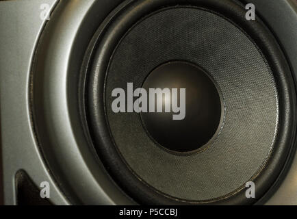 speaker music Detail shot of some old round speakers. Stock Photo