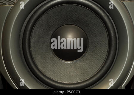 speaker music Detail shot of some old round speakers. Stock Photo