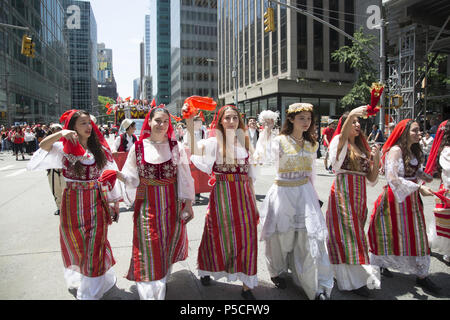 Proud energetic Albanian Americans march in the International Immigrants Parade along 6th Avenue in New York City. Stock Photo