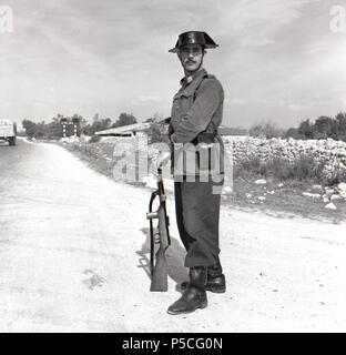 Two Spanish Civil Guard (Guardia Civil) Officers patrol the harbour on the  Spanish island of Tabarca Stock Photo - Alamy