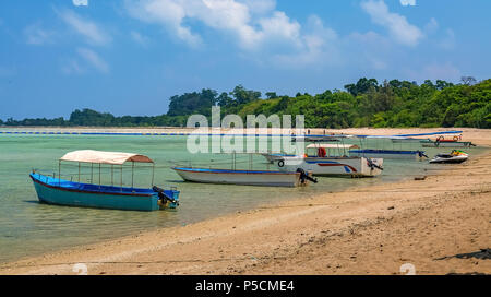 Radhanagar beach bay at Neil island with tourists speed boats used for sightseeing at Andaman, India. Stock Photo