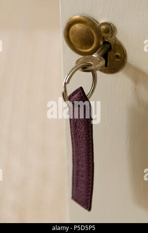 Close-up of key in lock Stock Photo