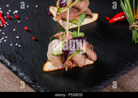 Beef canape served green onion Stock Photo