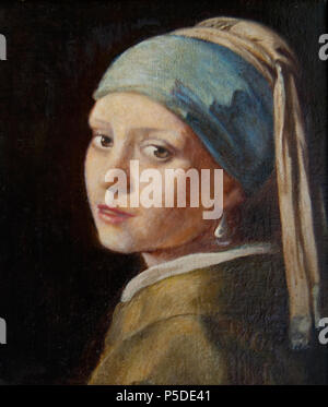 English: Girl with a Pearl Earring . Copy by Lawrence Saint of the painting of the same name by Jan Vermeer (1632-1675) . circa 1950. Lawrence Saint, after   Johannes Vermeer  (1632–1675)      Alternative names Johannes van der Meer, Jan Vermeer, Jan Vermeer van Delft, Johannes Reyniersz. Vermeer  Description Dutch painter and art dealer  Date of birth/death 31 October 1632 (baptised) 15 December 1675 (buried)  Location of birth/death Delft Delft  Work period 1653–1675  Work location Delft (1653–1675)  Authority control  : Q41264 VIAF: 51961439 ISNI: 0000 0001 0901 268X ULAN: 500032927 LCCN: n Stock Photo