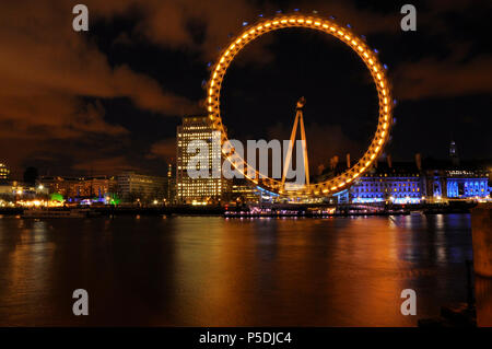 A colourful nighttime shot of the London eye