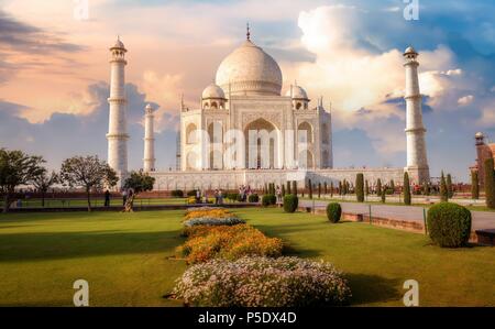Taj Mahal Agra at sunset with moody sky. A UNESCO World Heritage site. Stock Photo