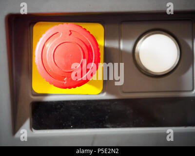 The red emergency button or stop button for Hand press. STOP Button for industrial machine, Emergency Stop for Safety Stock Photo