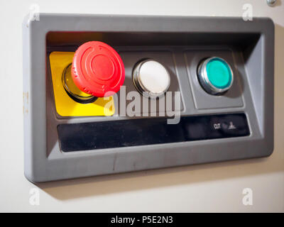 The red emergency button or stop button for Hand press. STOP Button for industrial machine, Emergency Stop for Safety Stock Photo