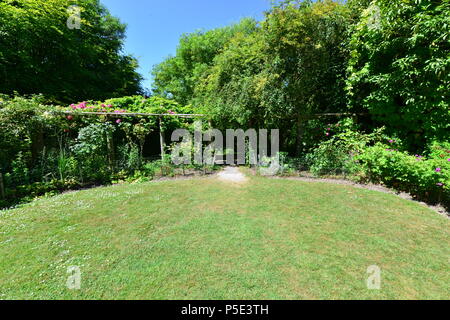 An English country garden in summertime. Stock Photo