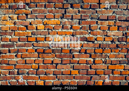 Old Brick Wall Texture. Background of Red Old Vintage Brick Wall. Brickwork Texture Stock Photo