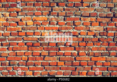 Old Brick Wall Texture. Background of Red Old Vintage Brick Wall. Brickwork Texture Stock Photo