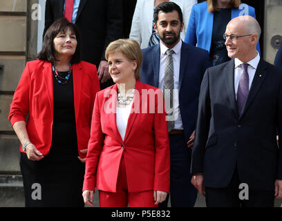 First Minister of Scotland, Nicola Sturgeon and Deputy First Minister John Swinney (right) with Jeane Freeman and Humza Yousaf during a photocall at Bute House in Edinburgh, following a Scottish cabinet reshuffle. Stock Photo