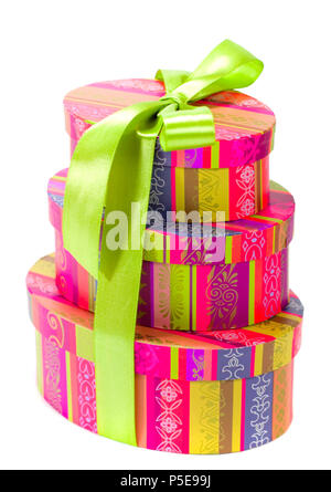 pyramid of colorful gift boxes with green bow on white background Stock ...