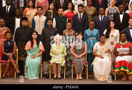 Queen Elizabeth II (centre front) joins some of the Queen's Young Leaders, who received their award at Buckingham Palace, for a group photograph. Stock Photo