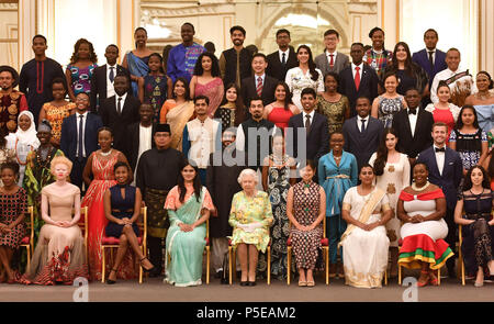 Queen Elizabeth II (centre front) joins some of the Queen's Young Leaders, who received their award at Buckingham Palace, for a group photograph. Stock Photo