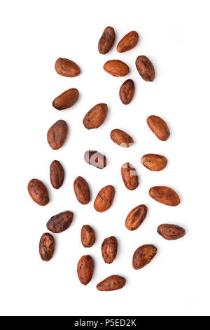 Cocoa beans (Theobroma cacao) photographed in the studio on a white background. Stock Photo