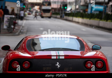 A red Italian sport car Ferrari 360 Challenge Stradale CS is parked in Sham Shui Po street, Hong Kong. Stock Photo
