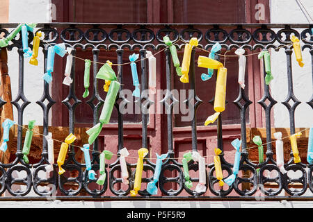 fake firecrackers on a balcony in spain Stock Photo