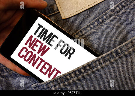 Writing note showing  Time For New Content. Business photo showcasing Copyright Publication Update Concept Publishing Human hand bring out cell phone  Stock Photo