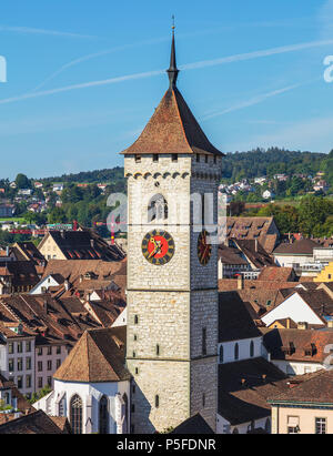 View of the city of Schaffhausen at the end of summer, tower of the St. Johann Church in the foreground. Schaffhausen is a city in northern Switzerlan Stock Photo