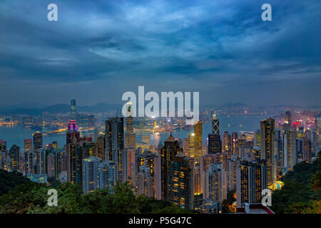 HONG KONG - NOV 6: Neon lights of Hong Kong on November, 6, 2017. Evening skyline from The Peak Stock Photo