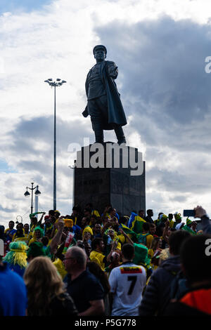 Brazilian fans celebrate their teams win outside of a stadium in St Petersburg, Russia. Stock Photo