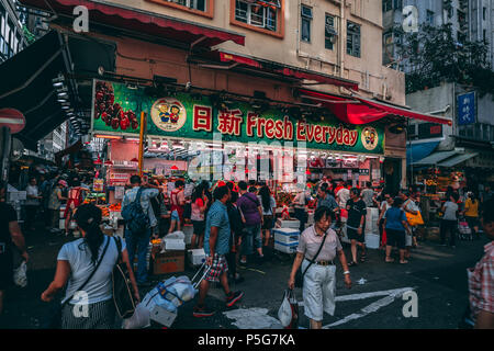 HONG KONG - MAY 30, 2018: Crowd of people at busy street food market in Wan Chai Hong Kong Stock Photo