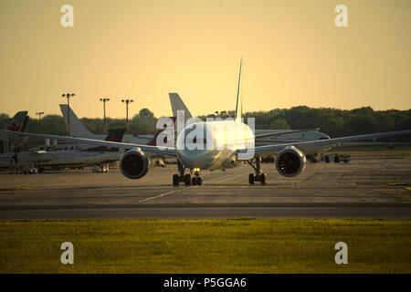 Montreal,Canada, 25 June 2018.Passenger jet taxiing  for take-off  from Trudeau International airport.Credit:Mario Beauregard/Alamy Live News Stock Photo