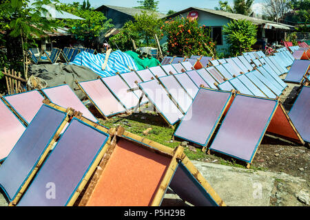 Screens with drying mulberry (saa) paper, near Chiang Mai, Thailand Stock Photo