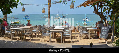 Bali, Indonesia - June 03, 2018; Beachside Restaurant Panorama at Sanur beach in the afternoon. Stock Photo