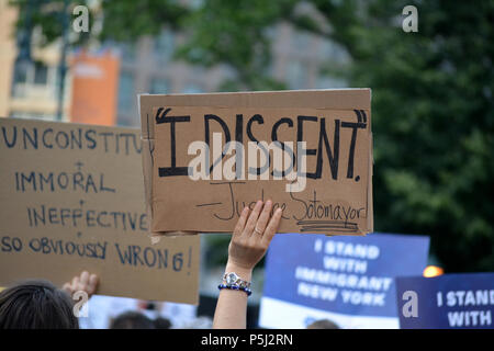 New York, USA. 26th June, 2018. People protesting the Supreme Court's vote to uphold Donald Trump's Muslim Travel Ban in Manhattan. Credit: Christopher Penler/Alamy Live News Stock Photo