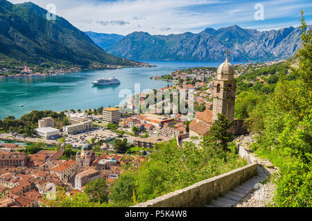 Scenic panoramic view of the historic town of Kotor with famous Bay of Kotor on a beautiful sunny day with blue sky and clouds, Montenegro, Balkans Stock Photo