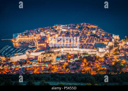 Panoramic aerial view of the historic town of Dubrovnik, one of the most famous tourist destinations in the Mediterranean Sea, in beautiful evening tw Stock Photo