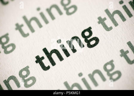 word thing printed on white paper macro Stock Photo