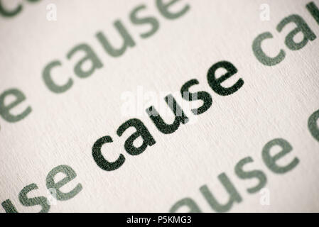 word cause printed on white paper macro Stock Photo