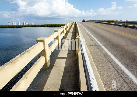 Florida,Fort Ft. Myers Beach,Lovers Key State Recreation Area,Estero Bay New Pass,bridge walkway,railing,skyline,water,FL170925071 Stock Photo