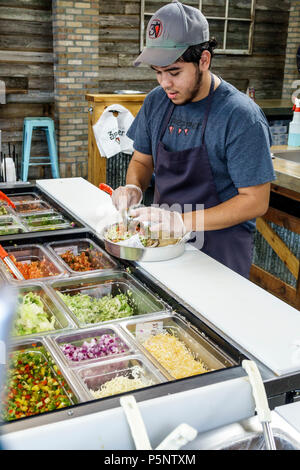 Fort Ft. Myers Florida,1st First Street,3 Pepper Burrito Co Company,restaurant restaurants food dining cafe cafes,Mexican fast food,Hispanic man men m Stock Photo