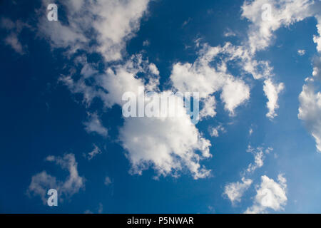 Beautiful white clouds float across the sky. Nature. Stock Photo