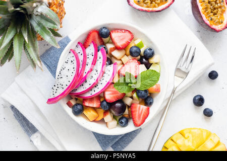 Fruit salad with dragon fruit, top view. Healthy eating, healthy lifestyle concept Stock Photo